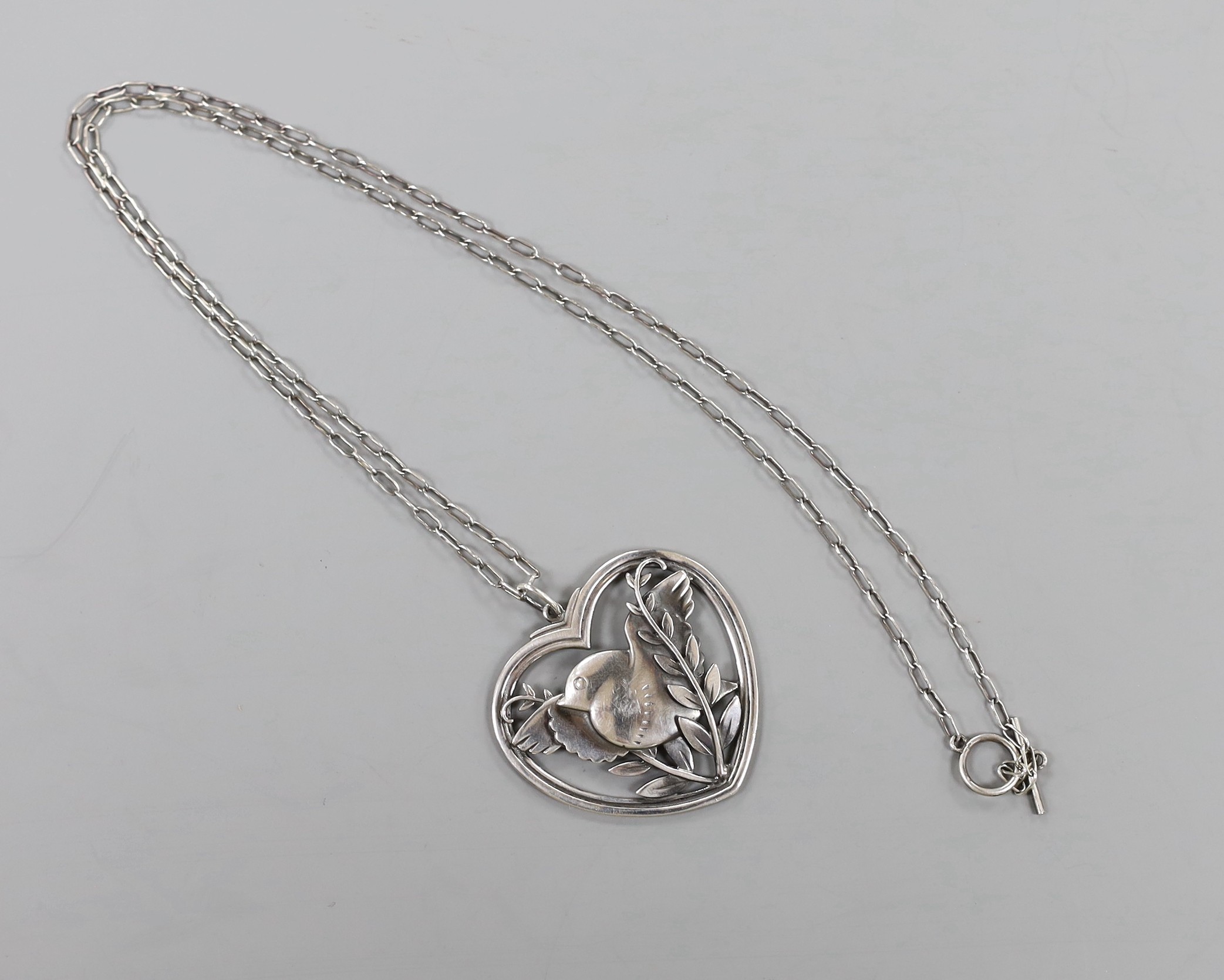 A Georg Jensen sterling 'Robin and frond' heart shaped pendant necklace, no. 97, 36mm.